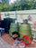 A group of composters in a  garden