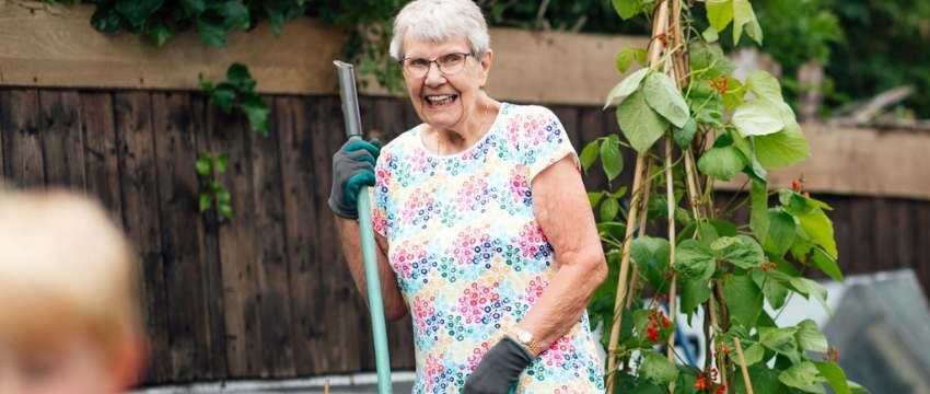 Woman Gardening | EvenGreener Beginner Guides